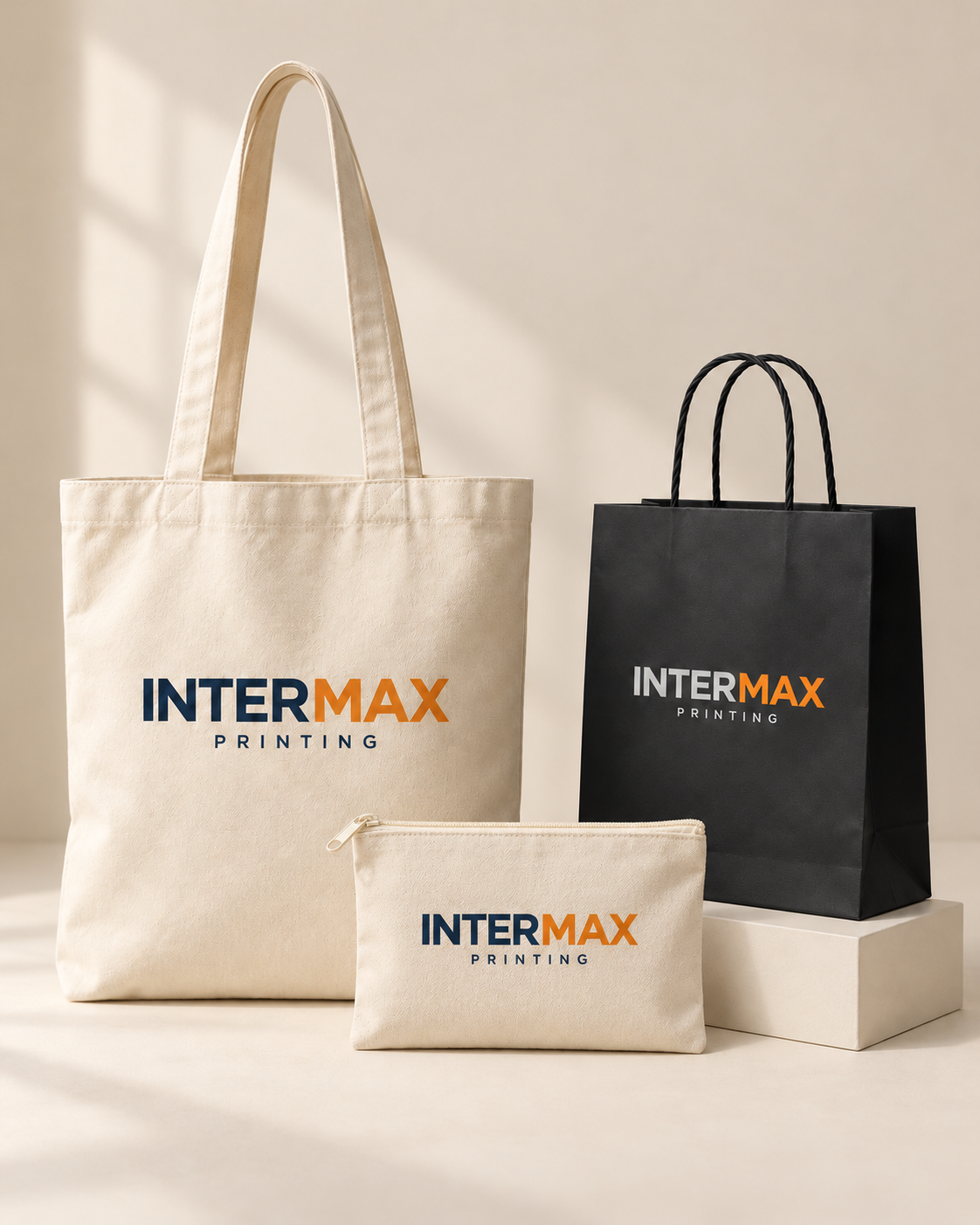 Illustrative Intermax fabric tote, paper bag and zipper pouch
